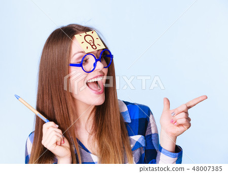 woman thinking light idea bulb on head, creative girl lots of ideas 48007385