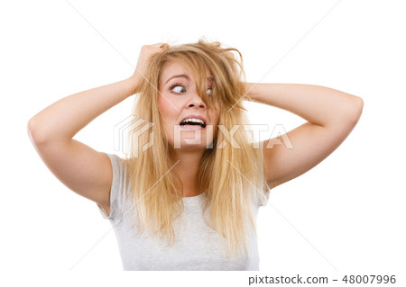 Crazy, mad blonde woman with messy hair Crazy, mad blonde woman with messy hair 48007996
