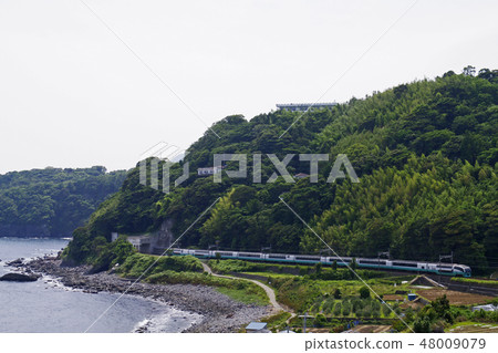 Izukyu line running along the sea Izukyu line running along the sea 48009079