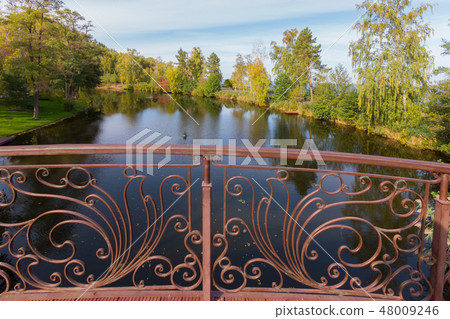 view from the wrought iron bridge to the river 48009246