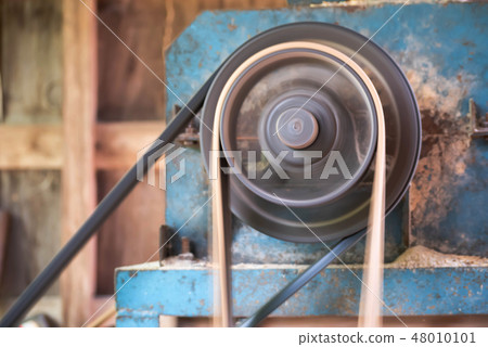 Old machine with belt industry is working 48010101