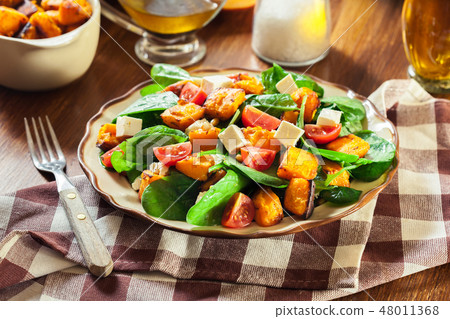 Roasted pumpkin salad with spinach Roasted pumpkin salad with spinach 48011368