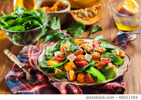 Roasted pumpkin salad with spinach Roasted pumpkin salad with spinach 48011369