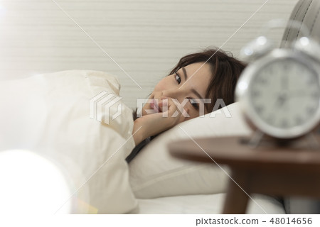 Waking up in the morning Sleeping woman lifestyle 48014656