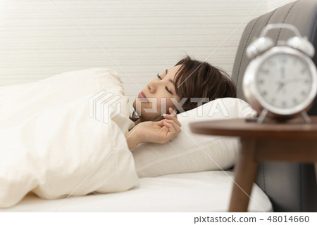 Waking up in the morning Sleeping woman lifestyle 48014660