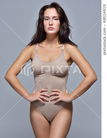 Beautiful woman in pastel underwear. 48014919