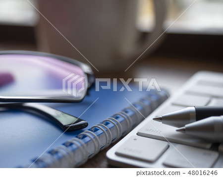 Business image · notebook · glasses · keyboard · calculator · cafe 48016246