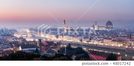AERIAL. Panorama of the city of FLORENCE in Italy with the dome and Palazzo della Signoria and arno AERIAL. Panorama of the city of FLORENCE in Italy with the dome and Palazzo della Signoria and arno 48017242