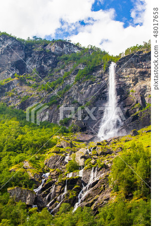 Giant Rjoandefossen waterfall by the Flam to Myrdal Railway Line Norway Giant Rjoandefossen waterfall by the Flam to Myrdal Railway Line Norway 48017658