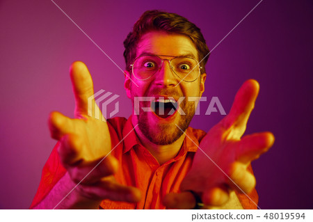 Winning success man happy ecstatic celebrating being a winner. Dynamic energetic image of male model Winning success man happy ecstatic celebrating being a winner. Dynamic energetic image of male model 48019594