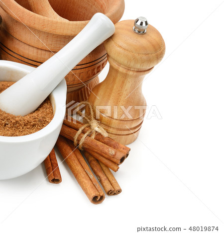 Cinnamon, mortar and pestle isolated  48019874