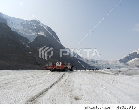 Athabasca big glacier and snow car and blue sky Athabasca big glacier and snow car and blue sky 48019919