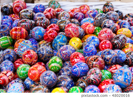 Colorful painted eggs at market, easter holidays. 48020016