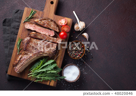 Grilled cowboy beef steak. 48020846