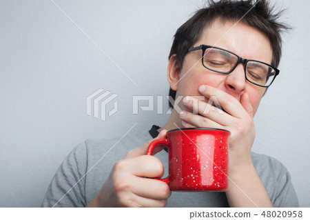 Sleepy yawning man. Sleepy yawning man. 48020958