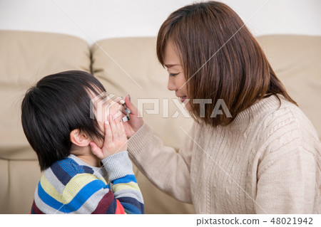 A boy who dislikes tooth brushing A boy who dislikes tooth brushing 48021942