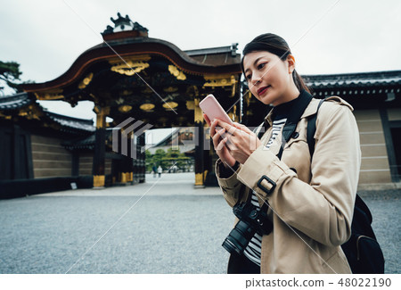 traveler with camera stand near flatland castle traveler with camera stand near flatland castle 48022190