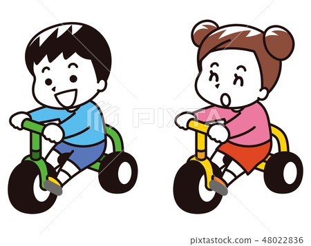 child on tricycle