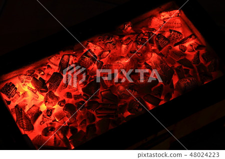 Charcoal in red tractor, flame in orange Charcoal in red tractor, flame in orange 48024223