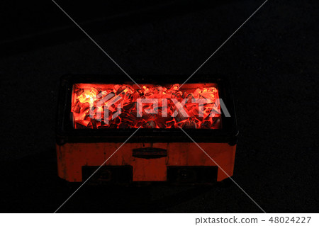 Charcoal in red tractor, flame in orange Charcoal in red tractor, flame in orange 48024227