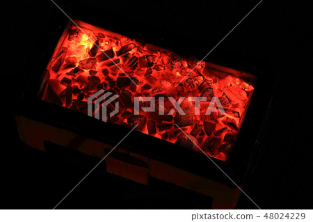 Charcoal in red tractor, flame in orange Charcoal in red tractor, flame in orange 48024229