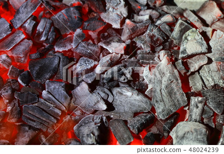Charcoal in red tractor, flame in orange Charcoal in red tractor, flame in orange 48024239