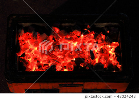 Charcoal in red tractor, flame in orange Charcoal in red tractor, flame in orange 48024248