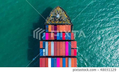 Container ship arriving in port, container ship. 48031129