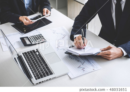 Business team investment working with computer and analysis grap 48031651