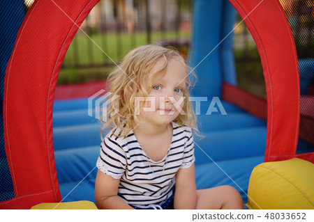 Lttle girl having fun in leisure center for kids 48033652