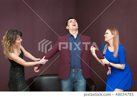 Women struggling to share a beloved man. Women struggling to share a beloved man. 48034785