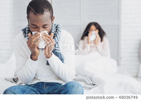 Attentive male person sitting on the foreground 48036749