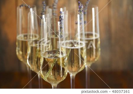 Glasses of champagne decorated with lavender  48037161
