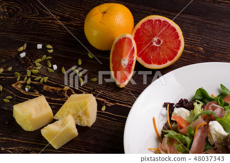 Delicious salad with grapefruit. Delicious salad with grapefruit. 48037343