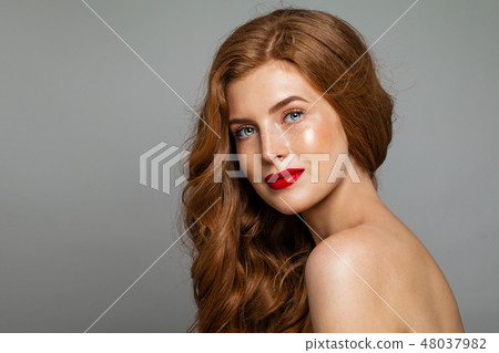Pretty redhead woman face. Red head girl  48037982