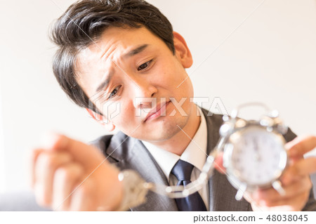 Businessman Time Binding 48038045