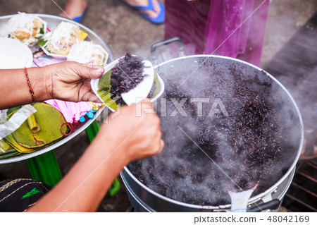 Thai Food Steamed Black Sticky Rice in Hot Steamer Thai Food Steamed Black Sticky Rice in Hot Steamer 48042169