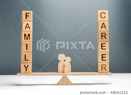 Family figures stand between career and family 48042222