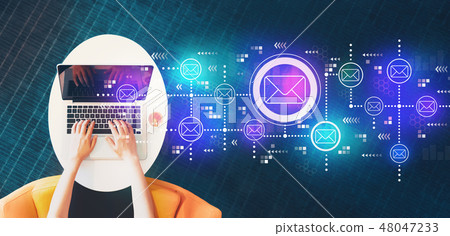 Emails with person using a laptop 48047233