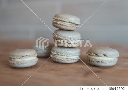 Cake macaron or macaroon on grey background, sweet and colorful dessert 48049592