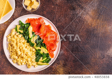 Ketogenic diet breakfast, scrambled eggs, salmon 48053838