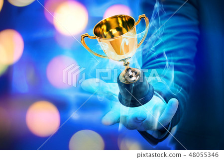Trophy and particle smoke effect on winner hand Trophy and particle smoke effect on winner hand 48055346