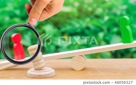 wooden figures of people. rivals in business 48056327