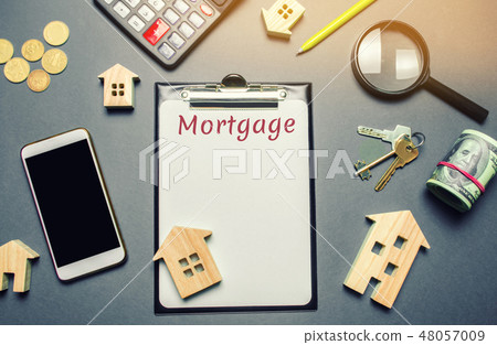 Table with wooden houses, calculator Table with wooden houses, calculator 48057009