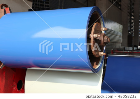 Coiled steel in metal sheet rolling machine Coiled steel in metal sheet rolling machine 48058232