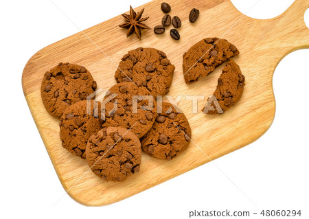 Biscuits with chocolate on a wooden board.  48060294