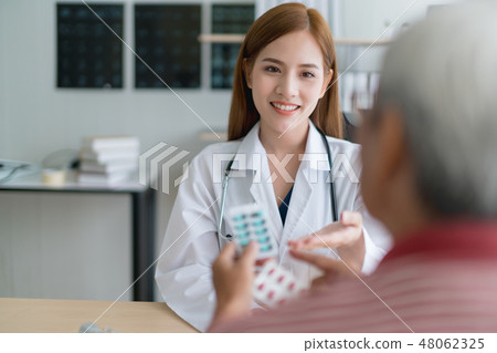 asian expert doctor examine explain to patient asian expert doctor examine explain to patient 48062325
