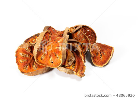 Slices of dried bael fruit Slices of dried bael fruit 48063920