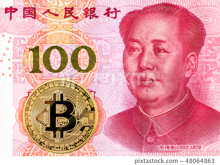 Bitcoin lying on the Chinese 100 yuan banknote Bitcoin lying on the Chinese 100 yuan banknote 48064863