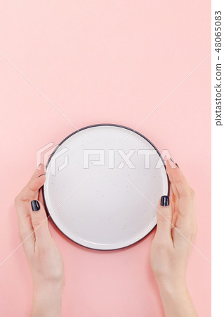 Empty plate in female hands mockup Empty plate in female hands mockup 48065083
